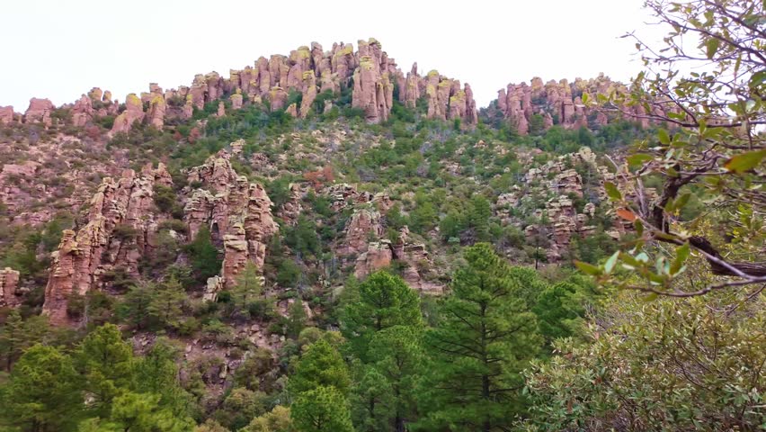Wide panorama of rhyolite pinnacles balanced rocks and hoodoos along Echo Canyon Trail in Chiricahua National Monument