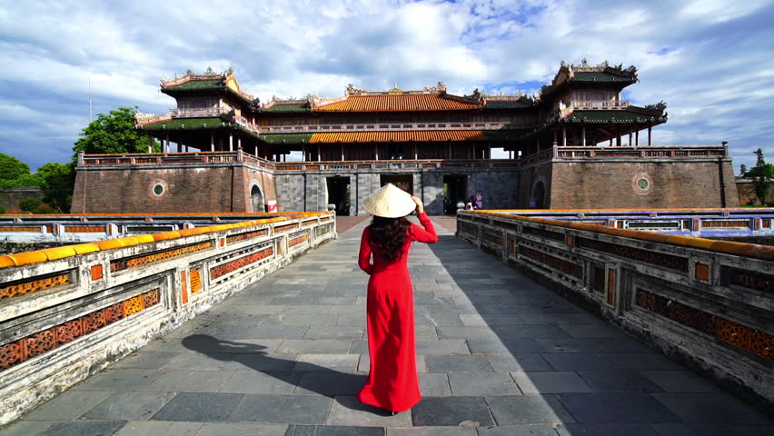 Tourist walking at Meridian Gate in Hue, Vietnam.