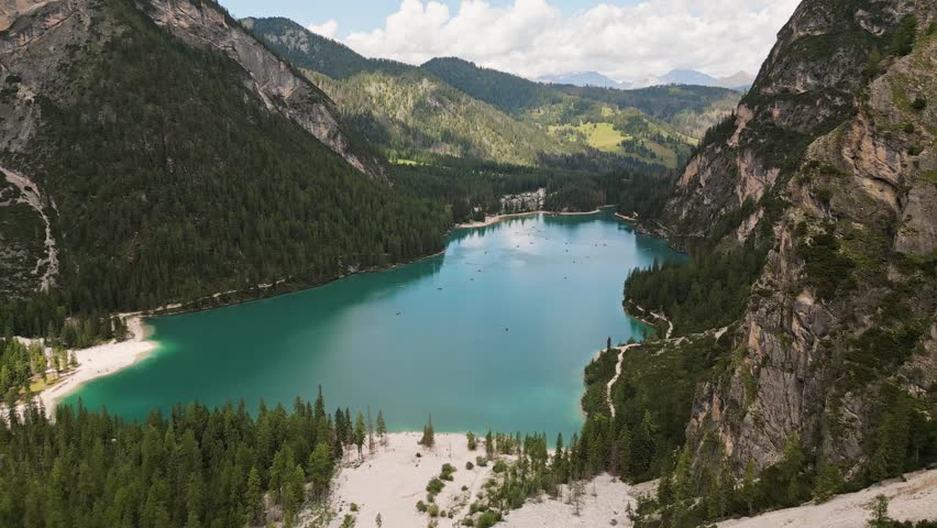Aerial view Lago di Braies lake in Dolomites mountains. Dolomiti. Italian alps. Turquoise lake in northern Italy. Popular summer visit destination Europe. Glacier alpine lake - Pragser Wildsee