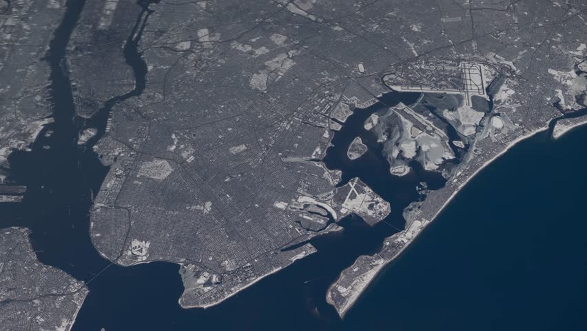 Flying over New York Manhattan winter snow cityscape satellite view from space based on Nasa imagery