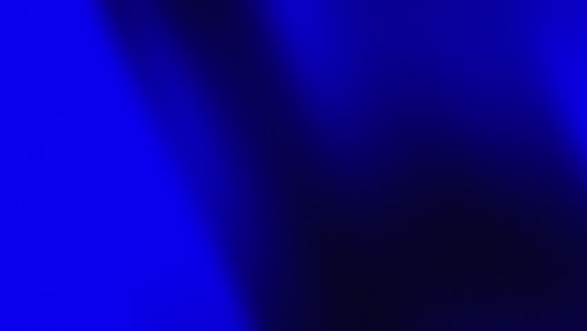 Abstract deep blue gradient with a glowing diagonal light beam and smooth transitions, creating a dynamic, modern, and atmospheric background