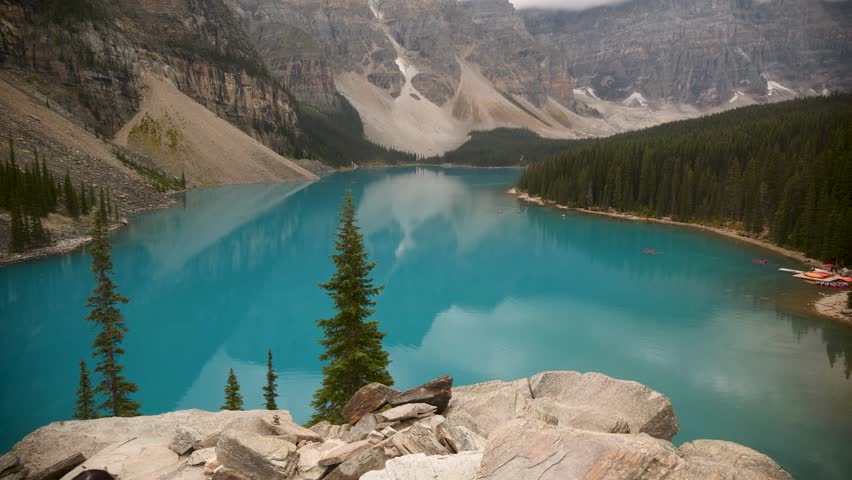 Majestic view of the turquoise Moraine Lake and the Valley of the Ten Peaks in Banff National Park, Alberta, Canada. Road trip in Canada. Rocky mountains. 4k footage.