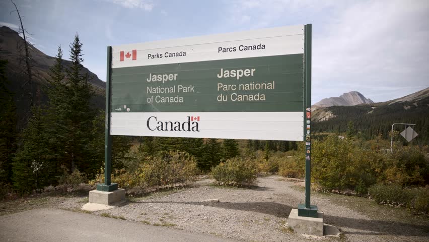 Welcome board of Jasper National Park of Canada along the scenic Icefields Parkway. Road trip in Canada. Rocky mountains. 4k footage