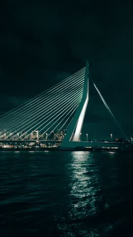 The Erasmus bridge at night, in the city of Rotterdam in The Netherlands. Light up.