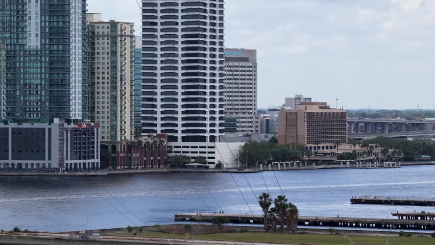 aerial footage of skyscrapers and office buildings along the St. Johns River in Jacksonville Florida USA