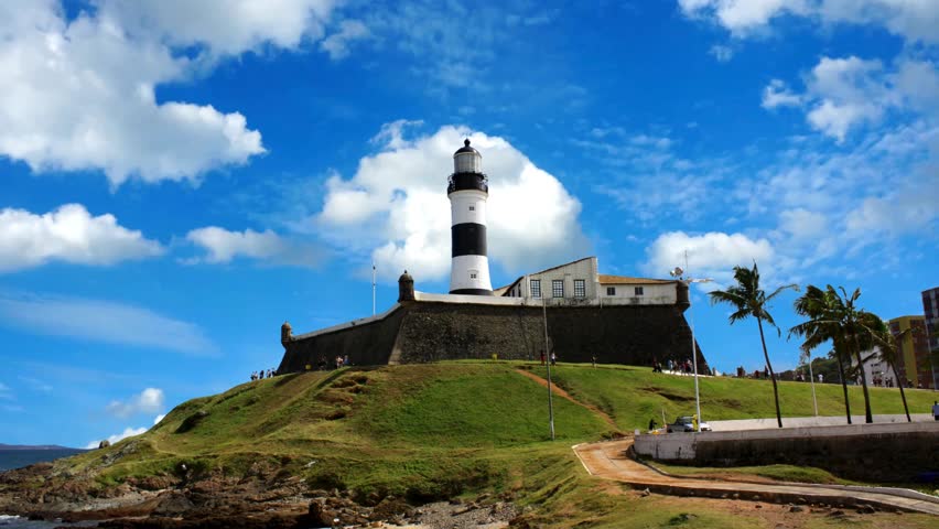 Aerial View of Farol da Barra Lighthouse With Atlantic Ocean in the Horizon, Salvador City, Northeast of BrazilCityscape of Salvador state of Bahia Brazil. Famous lighthouse tourism landmark. Northeast Brazil. Tropical travel destinations.Barra, , Bahia, Brazil. Panorama Landscape. Tropical Travel Destination. Barra . Bahia, Brazil. Aerial landscape. Barra  Aerial View, Bahia.