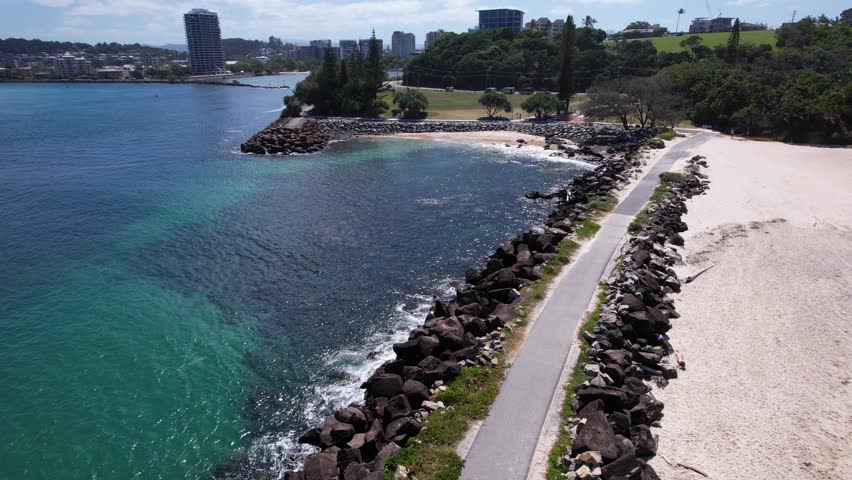 Duranbah Beach, Seawall, Tweed River And Little Duranbah Beach In Summer In Tweed Heads, NSW, Australia. - aerial pullback shot