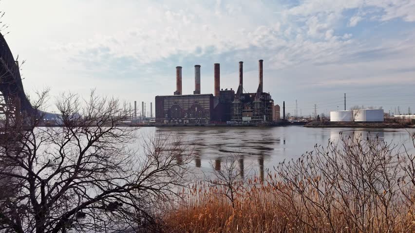 High-quality aerial drone footage of an abandoned power plant formerly operated by Public Service Electric and Gas Company in Kearny. This cinematic shot captures the decaying industrial structures, smokestacks, and surrounding urban landscape, highlighting themes of industrial decline, urban decay, and forgotten infrastructure.
Perfect for use in documentaries, news segments, environmental stories, historical retrospectives, or cinematic projects exploring energy, industry, abandonment, or post-industrial America. The footage offers a dramatic and atmospheric perspective from above, with strong visual storytelling potential.

Keywords: abandoned power plant, industrial ruins, urban decay, derelict factory, drone aerial, Kearny NJ, New Jersey industry, PSEG, power station, smokestacks, infrastructure, decay, environment, post-industrial, gritty, cinematic, establishing shot, energy industry, unused facility
