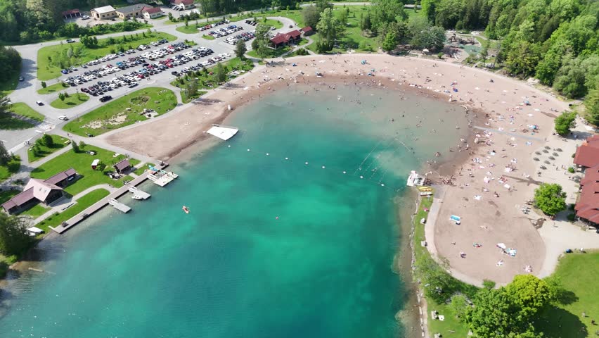 Swimming and simply just getting a tan along this state park beach front are all the activity that is necessary for many of the people that are scattered across the sand and water.