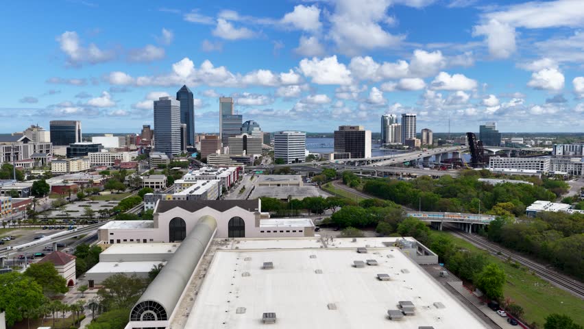 aerial footage of skyscrapers and office buildings along the St. Johns River in Jacksonville Florida USA