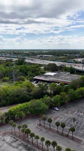 Aerial footage of cars driving on a highway in Jacksonville Florida USA