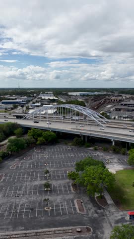 Aerial footage of cars driving on a highway in Jacksonville Florida USA