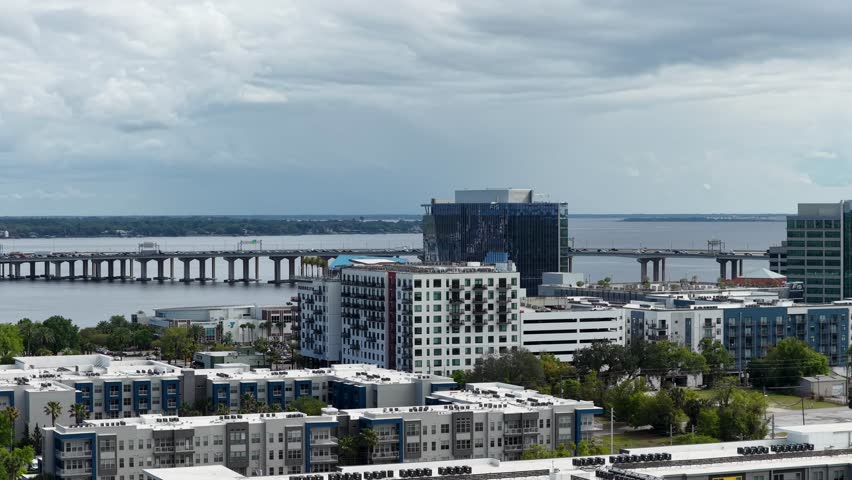 aerial footage of skyscrapers and office buildings along the St. Johns River in Jacksonville Florida USA