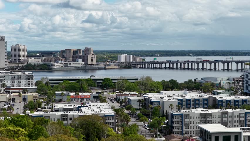 aerial footage of skyscrapers and office buildings along the St. Johns River in Jacksonville Florida USA
