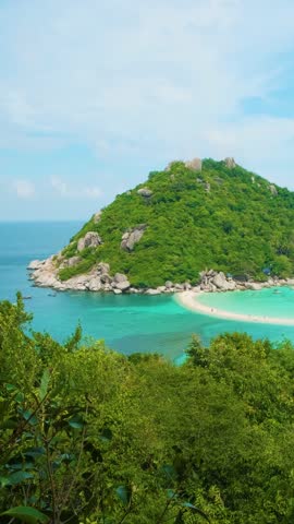 Thailand beach. Tropical Nang Yuan island, Koh Tao with lush green hills, white sandy beaches and turquoise waters surrounded by blue ocean. Travel destination for snorkeling and scuba diving