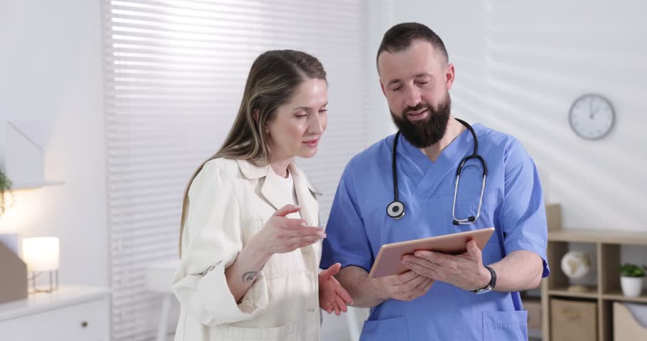 Woman having appointment with doctor in clinic