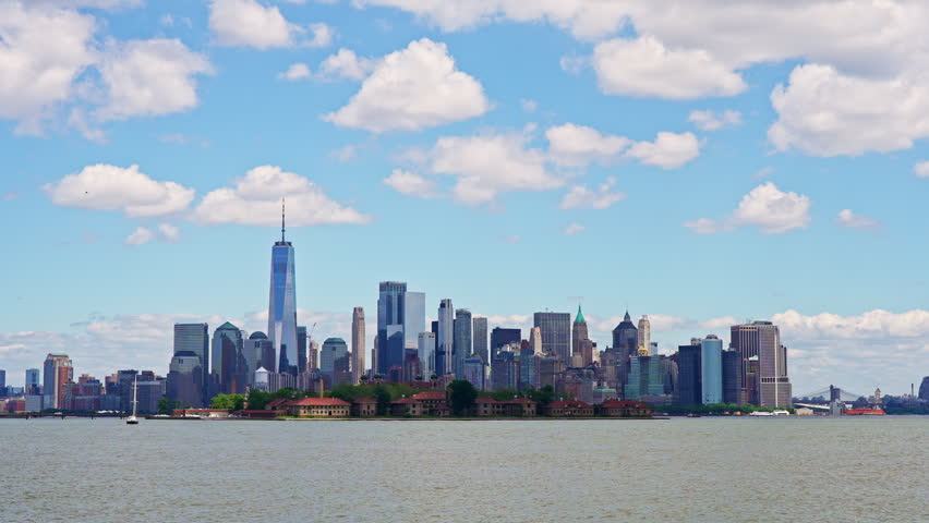 NYC skyline across Hudson River. New York Manhattan skyline in clear sky. NYC skyscrapers panoramic cityscape. New York City skyline. NYC Manhattan skyline with glass towers.