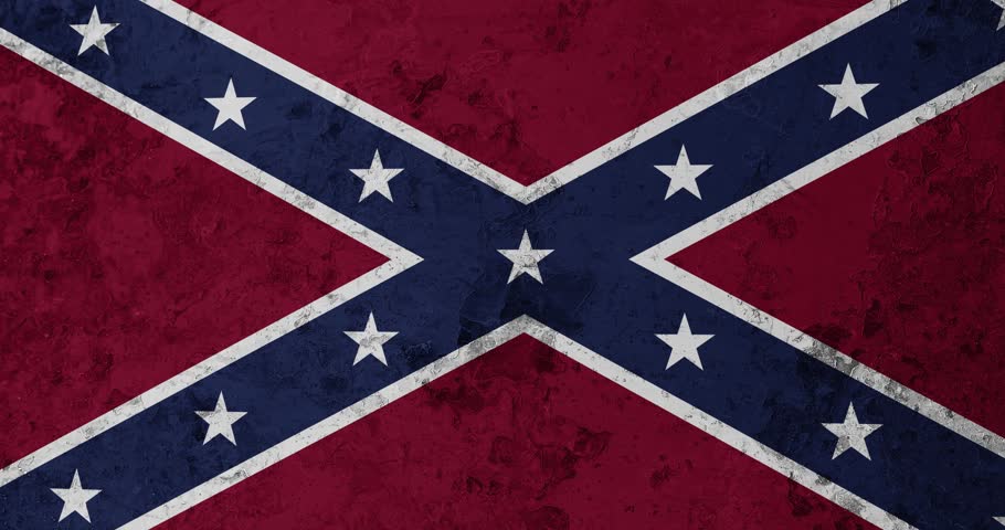 A zoom panning video of a worn out rusty wall with the onfederate state flag of the United States of America