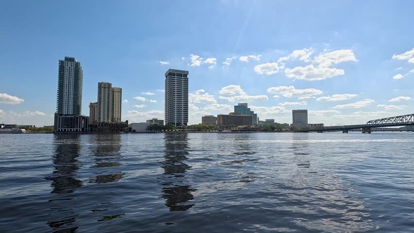 footage of skyscrapers and office buildings along the St. Johns River in Jacksonville Florida USA