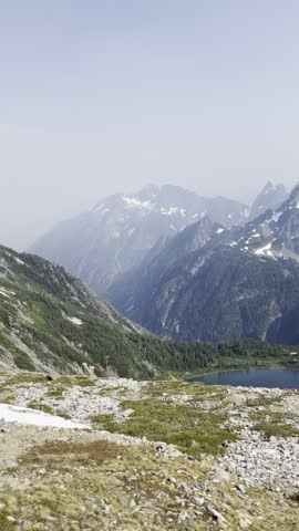 Panoramic View of Snow Capped Peaks and Alpine Lake from Sahale Arm Hiking Trail in North Cascades National Park