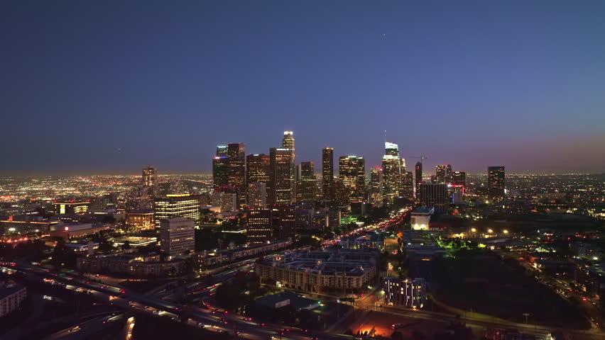 Los Angeles at night panorama. Los Angeles downtown night view. Los Angeles urban nightscape. Aerial view of Los Angeles skyscrapers at night.