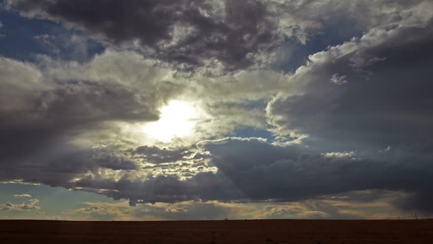 Sunshine behind Storm Clouds time lapse. HD 1080p
