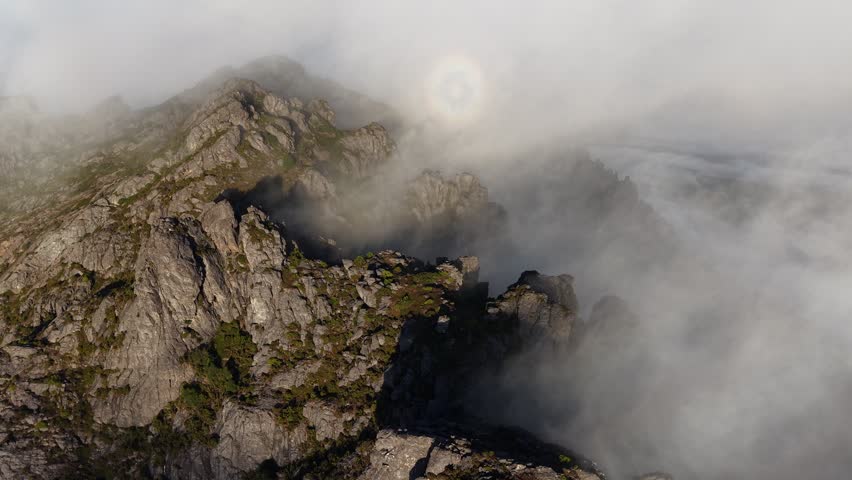 Sunrise and Cloud Inversion Rolling Fog above Mount Murchison, Tullah, Tasmania Aerial Drone 4K