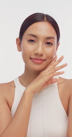 Portrait of a young Asian girl with light makeup and perfect skin. Beautiful face of young woman with natural skin.