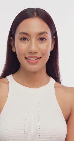 Portrait of a young Asian girl with light makeup and perfect skin. Beautiful face of young woman with natural skin.