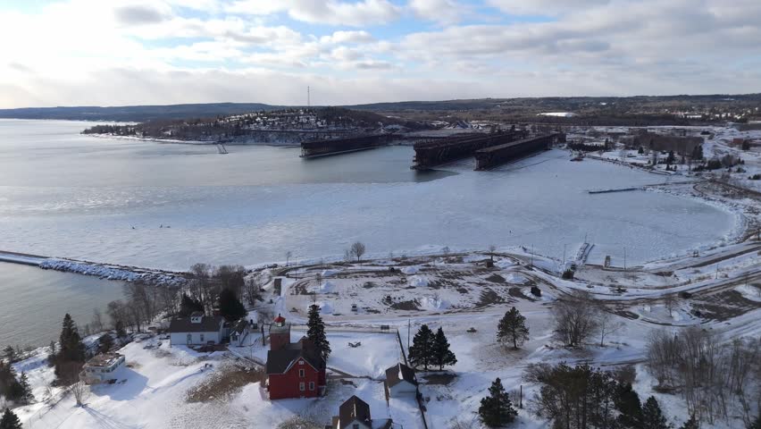 Bay at Two Harbors Minnesota during a winter sunset with Lake Superior frozen 2