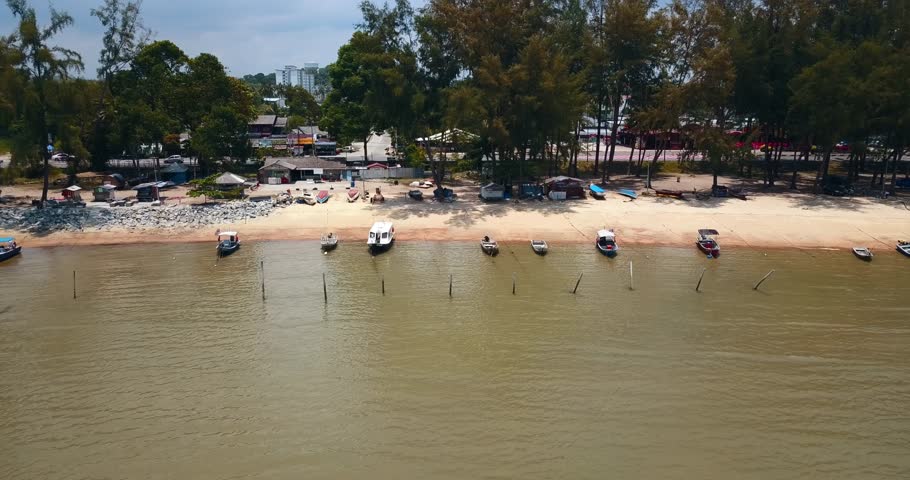Forward-moving aerial view of fishermen