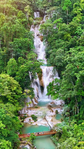 Scenic of Kuang Si Waterfall in Luang Phabang, Laos. Vertical footage.