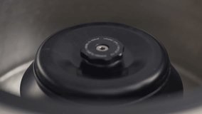 Detail of Laboratory Centrifuge Rotor with Sample Tubes - Powered by Shutterstock - Get 15% off with code: PIKWIZARD15
