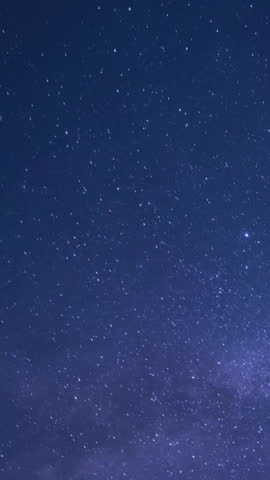 Time lapse capturing the breathtaking Perseid meteor shower with bright meteors streaking across a clear night sky creates a stunning celestial scene filled with motion, wonder, and cosmic beauty. Sparkling stars, fast shooting trails, and deep nocturnal atmosphere make this footage ideal for astronomy, science, space, travel, documentaries, and inspirational storytelling themes. Perfect stock footage for educational visuals, cinematic backgrounds, and immersive presentations with a serene awe inspiring mood.