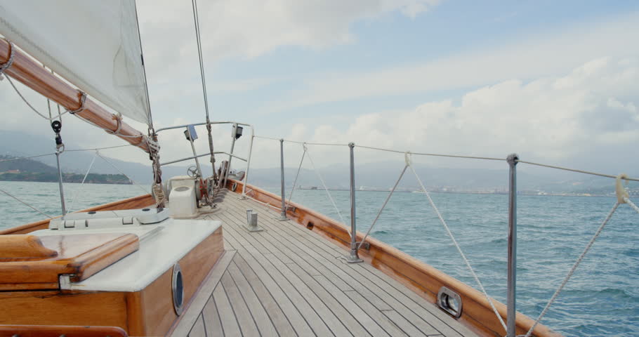 Travel, sailing and holiday with yacht outdoor for tropical getaway, summer vacation and journey. Transportation, luxury cruise and adventure with boat in nature for seaside, ocean and paradise