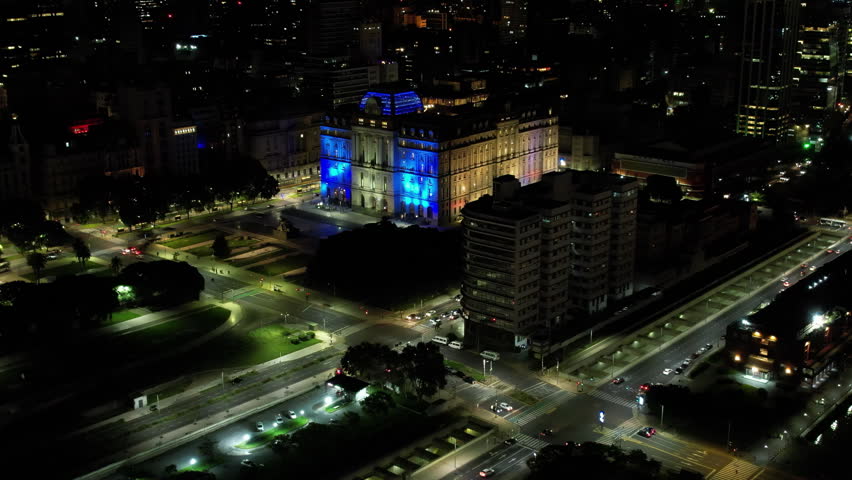 Aerial Night View of Palacio Libertad and Buenos Aires City Streets
