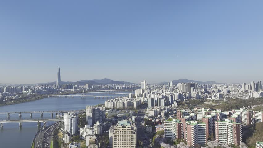 Aerial view of Han River and Jamsil skyline seen from Gwangjin-gu, Seoul, South Korea.