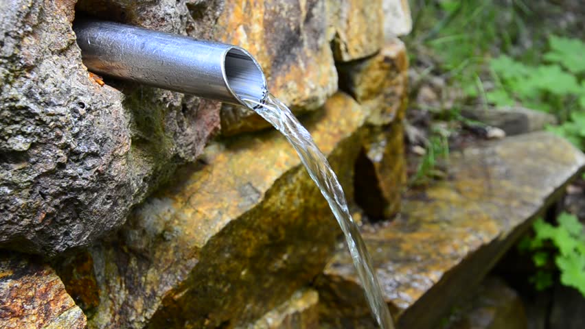 HD1080: Jet of ecological clean drinkable water is coming out of a pipe in