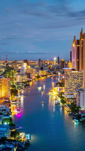 Aerial view of Bangkok city at night, Thailand. Vertical.
