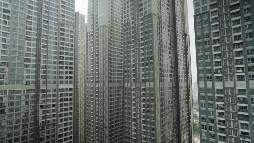 Modern high rise apartment towers in Ho Chi Minh City Saigon Vietnam urban skyline, static backdrop