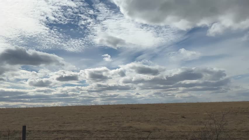 Clouds in blue sky with natural light and soft cloudscape forming scenic atmospheric background