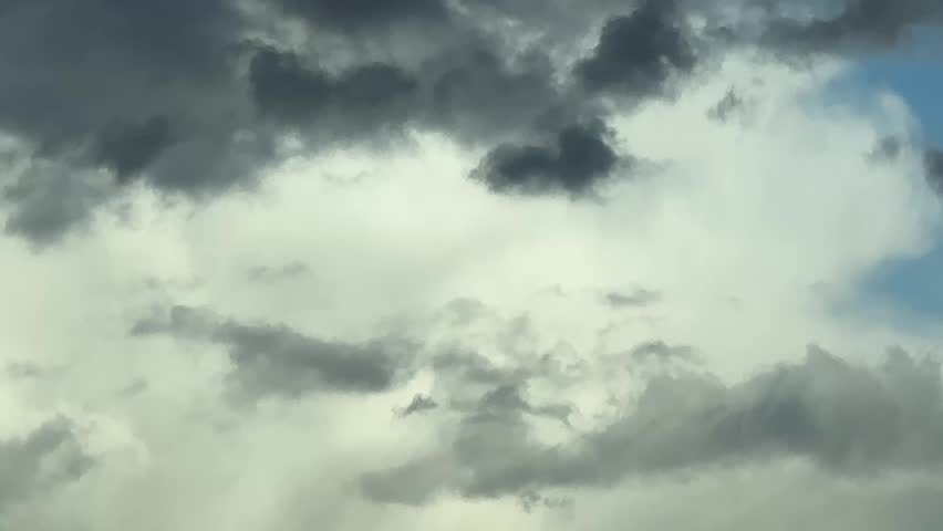 Storm clouds forming in sky with dark atmosphere showing dramatic weather conditions and natural environment