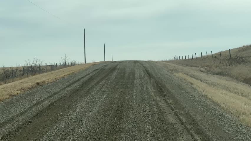 Driving Through Rural Countryside Gravel Road