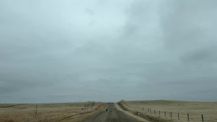 Driving On Gravel Road In Alberta