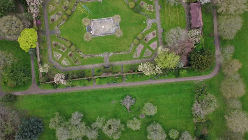 Aerial drone flight over the historic Canons Park in Stanmore, North London, featuring the ornate King George V Memorial Garden.
