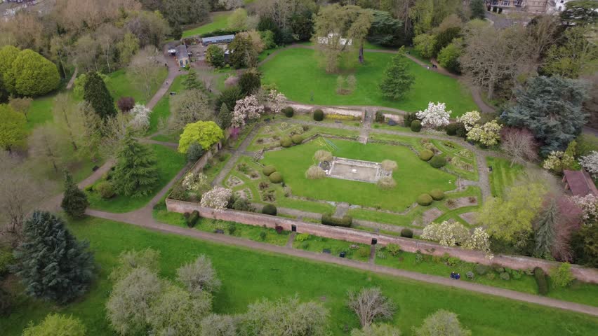 Aerial drone flight over the historic Canons Park in Stanmore, North London, featuring the ornate King George V Memorial Garden.
