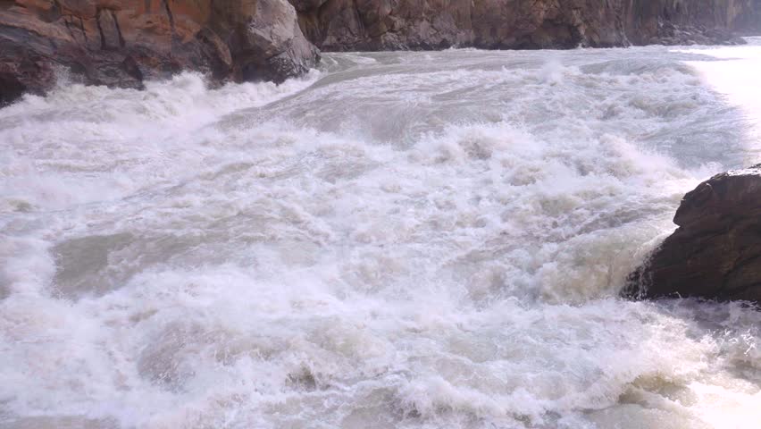 Turbulent Jinsha River Rapids in Tiger Leaping Gorge, Yunnan, China
Majestic Canyon Scenery of Tiger Leaping Gorge with Powerful River Currents