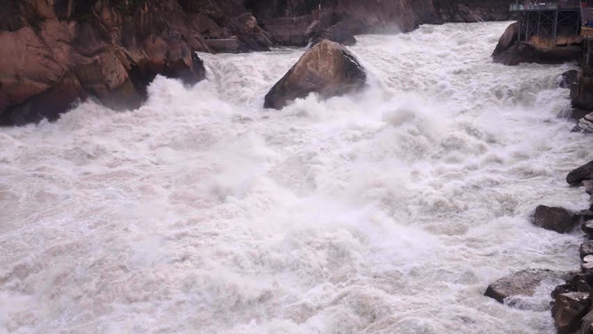 Turbulent Jinsha River Rapids in Tiger Leaping Gorge, Yunnan, China
Majestic Canyon Scenery of Tiger Leaping Gorge with Powerful River Currents