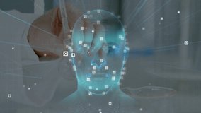 Clinician hand guiding probe along wireframe head, activating markers for clinical facial mapping. Holographic, cranial, 3d, model, data, analytics, lab - Powered by Shutterstock - Get 15% off with code: PIKWIZARD15