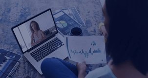Diverse female team reviewing charts at home, viewing laptop with HUD overlays, copy space. Remote, collaboration, screen, dashboard, graphs, analytics, multitasking - Powered by Shutterstock - Get 15% off with code: PIKWIZARD15